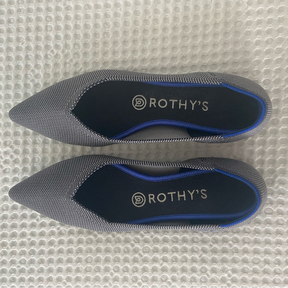 Rothy’s “The Point” black tweed.
Size 7.5